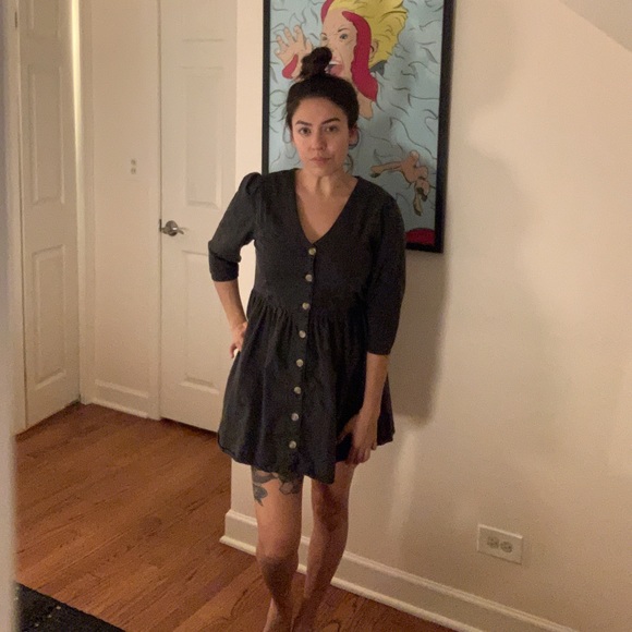 Black v neck mini dress.
